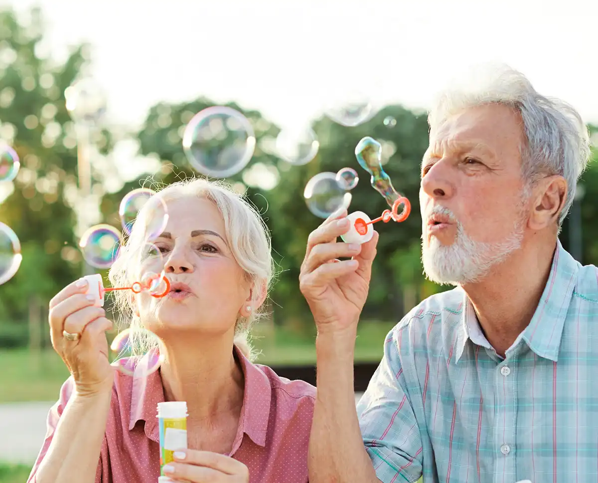 couple blowing bubbles