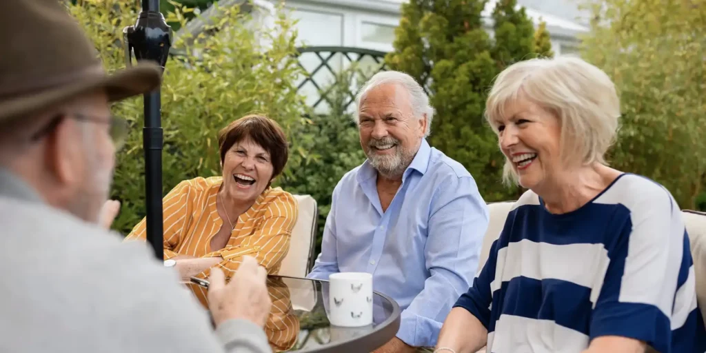 Group of seniors chatting outdoors